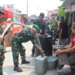 Kodim 0913/PPU Salurkan Air Bersih Kepada Warga Penajam.