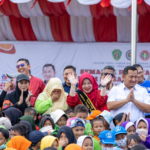 Ketua Bunda Pendidikan Anak Usia Dini (PAUD) Kabupaten Penajam Paser Utara (PPU) Dewi Yuliana saat menghadiri peringatan Hari Olahraga Nasional (Haornas) 2026.